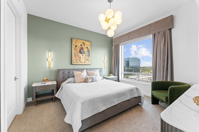 2207 Bancroft St Unit 1104, Houston, TX 77027 - bedroom with a chandelier and carpet floors