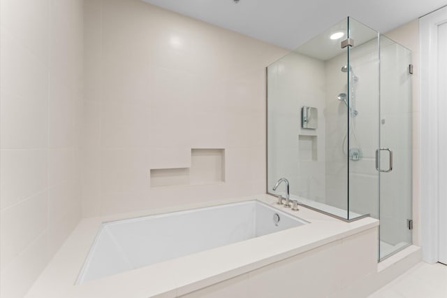 2207 Bancroft St Unit 1104, Houston, TX 77027 - bathroom with a shower stall and a bath