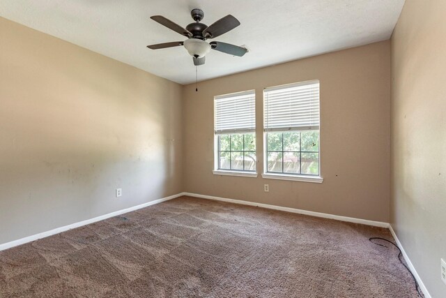 2611 Potomac Dr, League City, TX 77573 - empty room with carpet floors and a ceiling fan