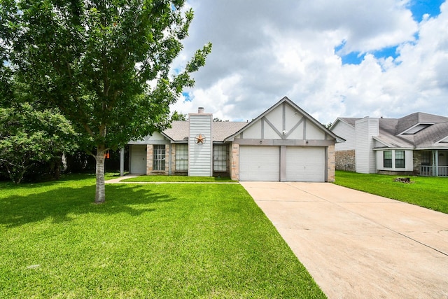16810 Rockstone, Houston, TX 77084 - view of front facade featuring an attached garage, a front lawn, concrete driveway, and a chimney