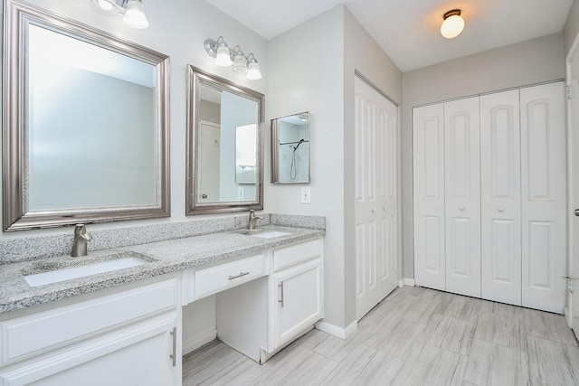 16810 Rockstone, Houston, TX 77084 - full bathroom with a closet and double vanity