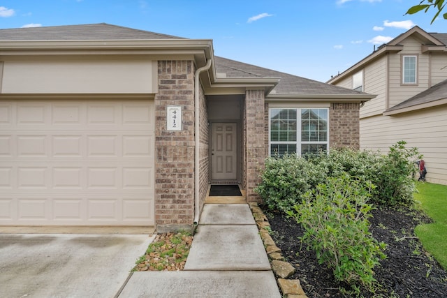 4412 Eveslage Ln, Conroe, TX 77304 - doorway to property with brick siding, concrete driveway, a shingled roof, and a garage
