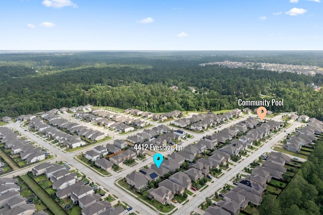 4412 Eveslage Ln, Conroe, TX 77304 - aerial overview of property's location featuring a forest and nearby suburban area