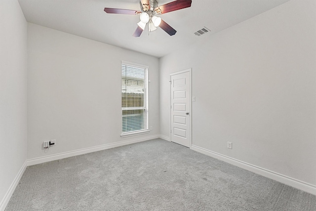 14251 Archer County Trl, Cypress, TX 77429 - carpeted empty room with a ceiling fan and baseboards