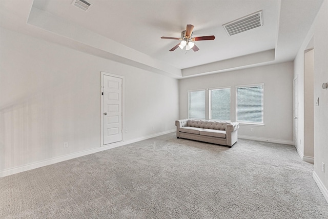 14251 Archer County Trl, Cypress, TX 77429 - sitting room featuring a raised ceiling, a ceiling fan, and carpet floors