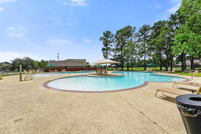 14251 Archer County Trl, Cypress, TX 77429 - community pool with a patio