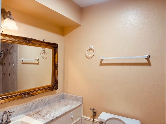 7900 Westheimer Rd Unit 143, Houston, TX 77063 - bathroom with a shower and vanity