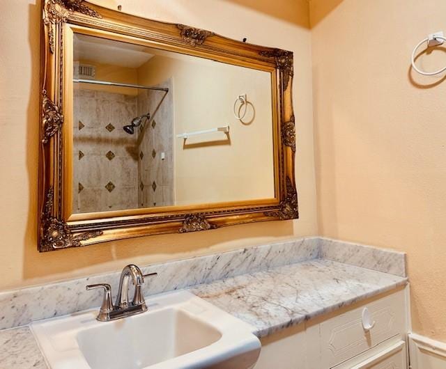 7900 Westheimer Rd Unit 143, Houston, TX 77063 - full bathroom with a sink and tiled shower