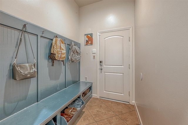 5918 Emmit Creek Ln, Sugar Land, TX 77479 - mudroom featuring tile patterned floors and baseboards