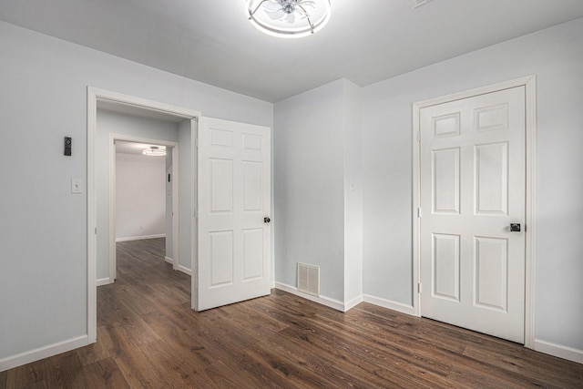 8419 Sterlingshire St, Houston, TX 77078 - unfurnished bedroom with dark wood-style floors