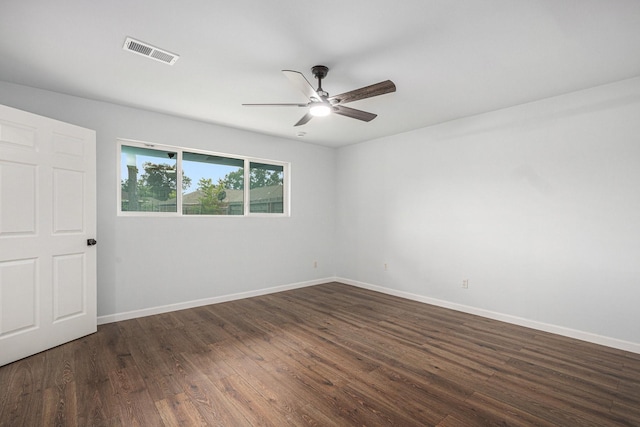 8419 Sterlingshire St, Houston, TX 77078 - unfurnished room with ceiling fan and dark wood-style floors