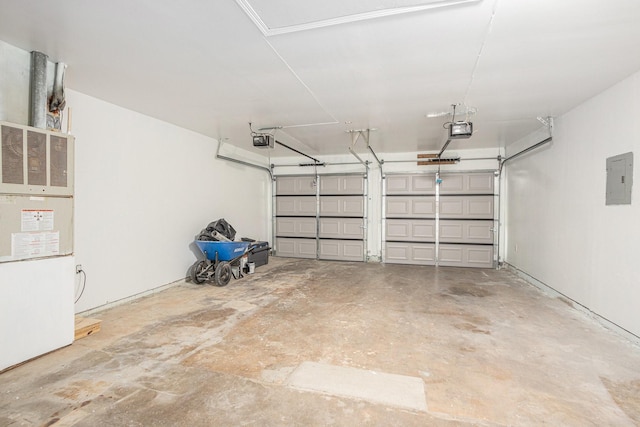 8419 Sterlingshire St, Houston, TX 77078 - garage with a garage door opener and electric panel