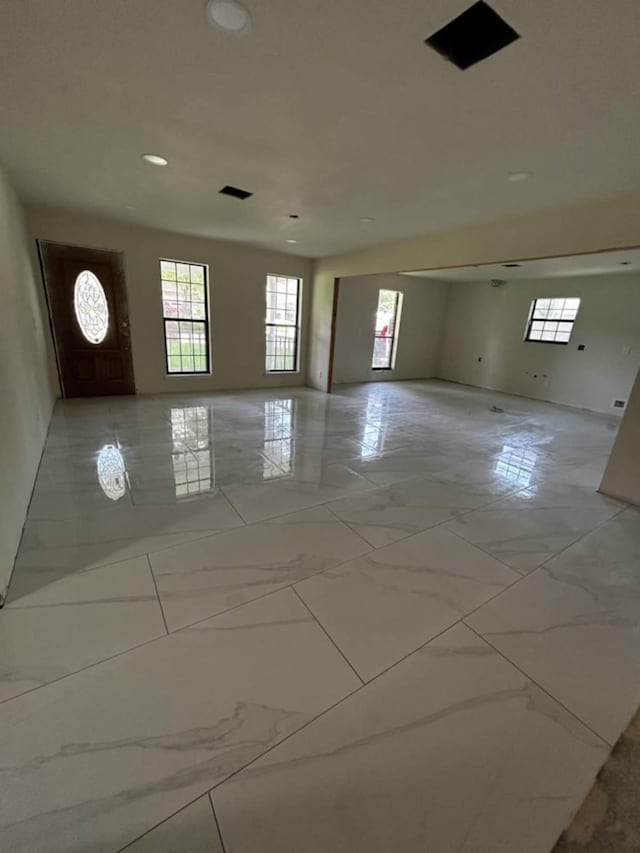 12206 Fairhaven Ln, Montgomery, TX 77356 - empty room featuring light marble finish floors and recessed lighting
