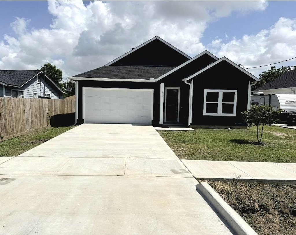 515 Briarcliff Dr, Houston, TX 77076 - single story home with an attached garage and concrete driveway