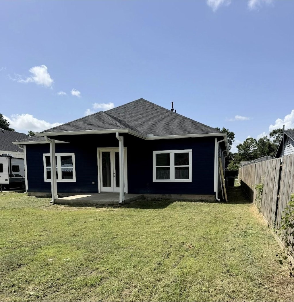 515 Briarcliff Dr, Houston, TX 77076 - back of house featuring french doors and roof with shingles