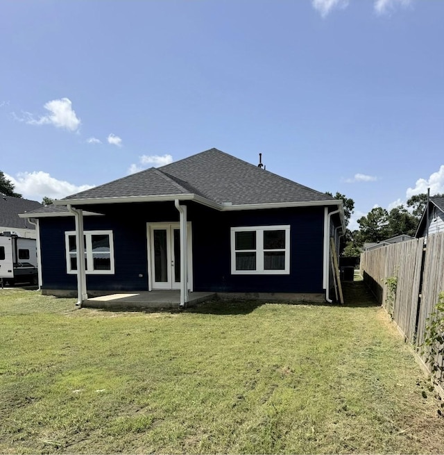 515 Briarcliff Dr, Houston, TX 77076 - back of house featuring french doors and roof with shingles