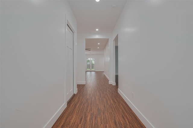 515 Briarcliff Dr, Houston, TX 77076 - hall with dark wood-style flooring and recessed lighting