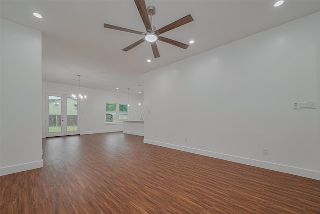 515 Briarcliff Dr, Houston, TX 77076 - unfurnished living room featuring a ceiling fan, dark wood-style floors, a chandelier, and recessed lighting