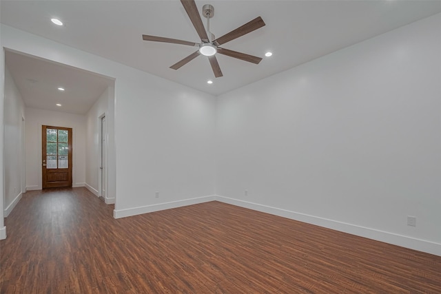 515 Briarcliff Dr, Houston, TX 77076 - empty room with dark wood-style flooring, ceiling fan, and recessed lighting