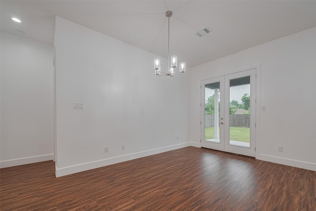 515 Briarcliff Dr, Houston, TX 77076 - empty room featuring french doors, dark wood-type flooring, a chandelier, and recessed lighting