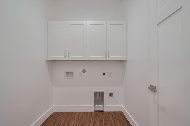 515 Briarcliff Dr, Houston, TX 77076 - washroom with cabinet space, hookup for an electric dryer, dark wood-style flooring, hookup for a washing machine, and gas dryer hookup