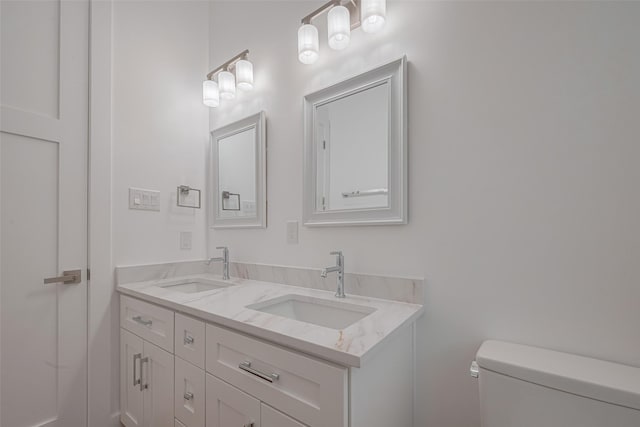 515 Briarcliff Dr, Houston, TX 77076 - bathroom featuring toilet and double vanity