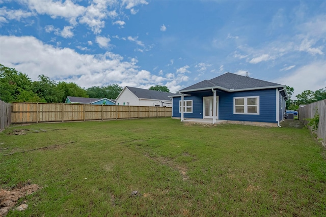 515 Briarcliff Dr, Houston, TX 77076 - rear view of house with a fenced backyard and a patio area