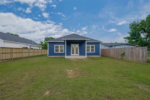 515 Briarcliff Dr, Houston, TX 77076 - rear view of house featuring a fenced backyard, a patio, and french doors