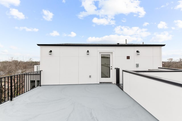 1805 Sakowitz St, Houston, TX 77020 - rear view of house featuring a balcony and stucco siding