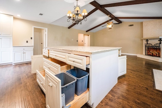 2110 Trailing Vine Rd, Spring, TX 77373 - kitchen featuring dark wood-style flooring, recessed lighting, a center island, a chandelier, and white cabinets