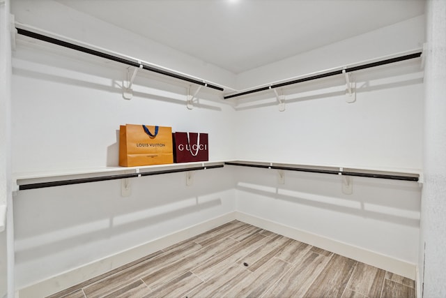 13826 Swan Hollow Ln, Houston, TX 77041 - spacious closet featuring light wood finished floors