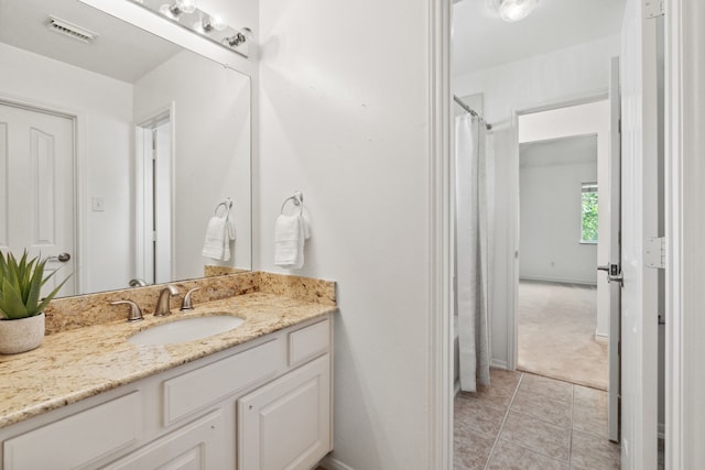 13826 Swan Hollow Ln, Houston, TX 77041 - bathroom featuring vanity and tile patterned floors