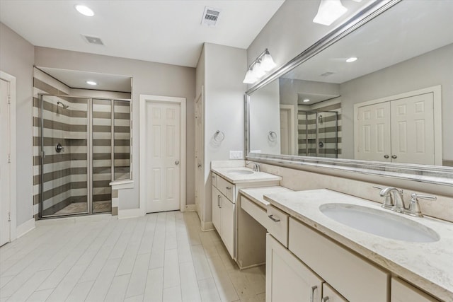 4205 Dickson St, Houston, TX 77007 - full bathroom with a shower stall, vanity, and recessed lighting