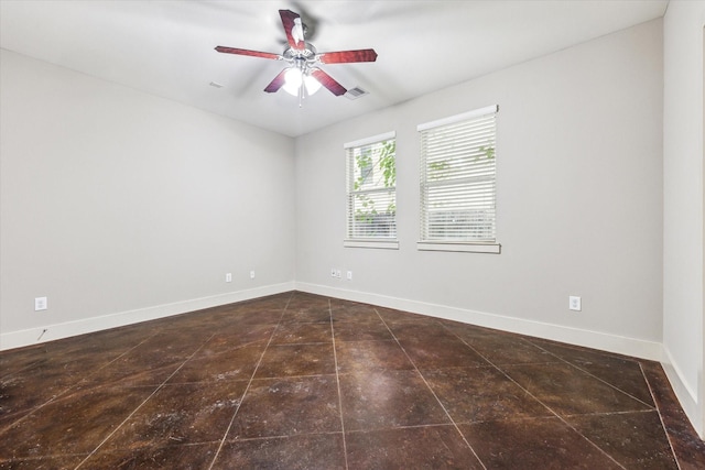 4205 Dickson St, Houston, TX 77007 - unfurnished room featuring a ceiling fan and baseboards