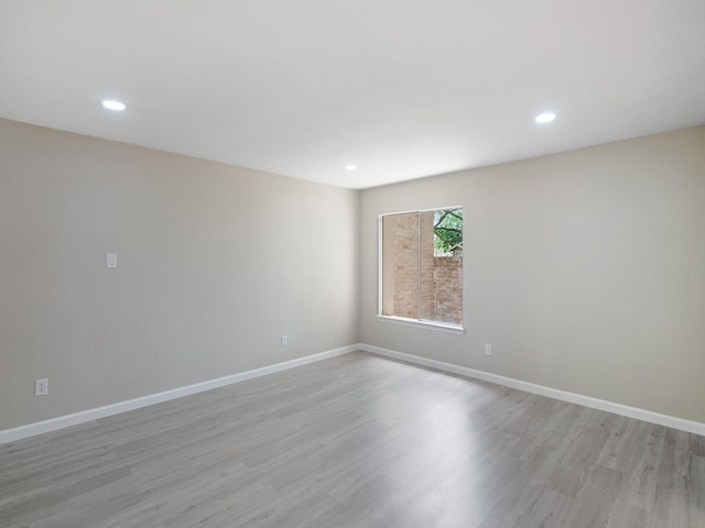 11624 Village Place Dr Unit 327, Houston, TX 77077 - spare room with light wood-style flooring and recessed lighting