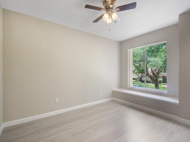 11624 Village Place Dr Unit 327, Houston, TX 77077 - spare room featuring light wood-style flooring and a ceiling fan