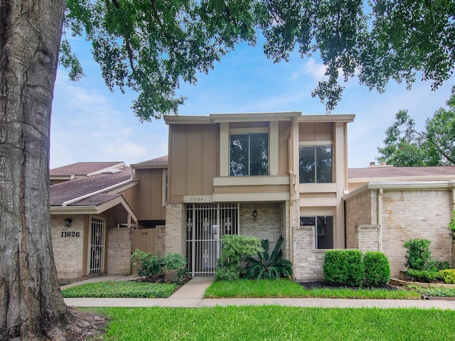 11624 Village Place Dr Unit 327, Houston, TX 77077 - view of front of home with brick siding