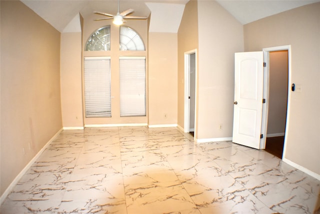 4611 Green Trail Dr, Houston, TX 77084 - spare room featuring high vaulted ceiling, marble finish floors, and ceiling fan