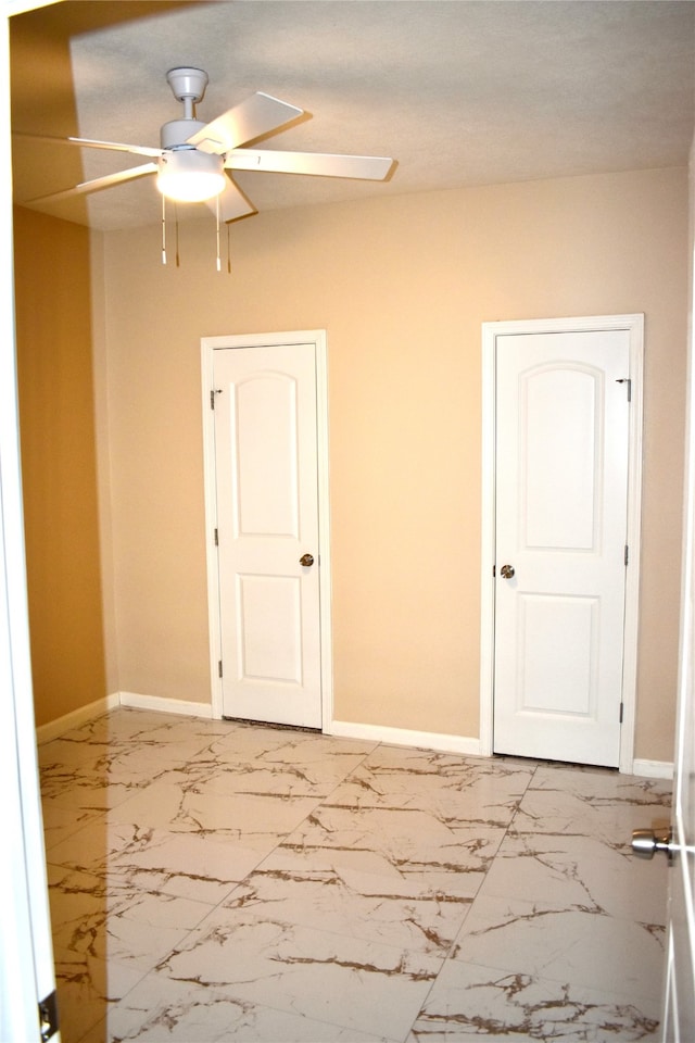 4611 Green Trail Dr, Houston, TX 77084 - spare room with ceiling fan and marble finish floors