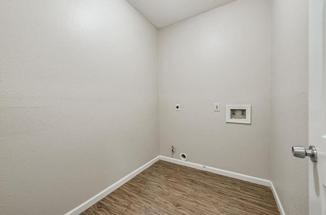 4611 Green Trail Dr, Houston, TX 77084 - washroom featuring electric dryer hookup, washer hookup, wood finished floors, and hookup for a gas dryer