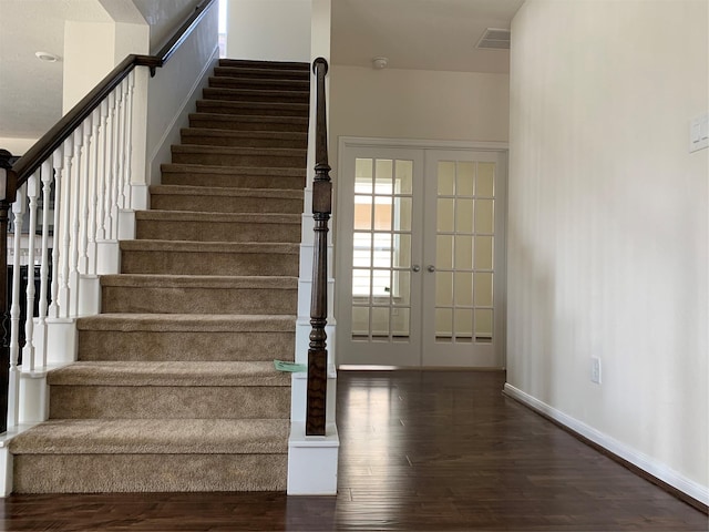 15815 Copper Oak Ln, Houston, TX 77084 - stairs featuring wood finished floors and french doors