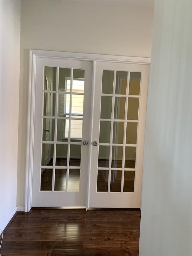 15815 Copper Oak Ln, Houston, TX 77084 - doorway with dark wood-type flooring and french doors