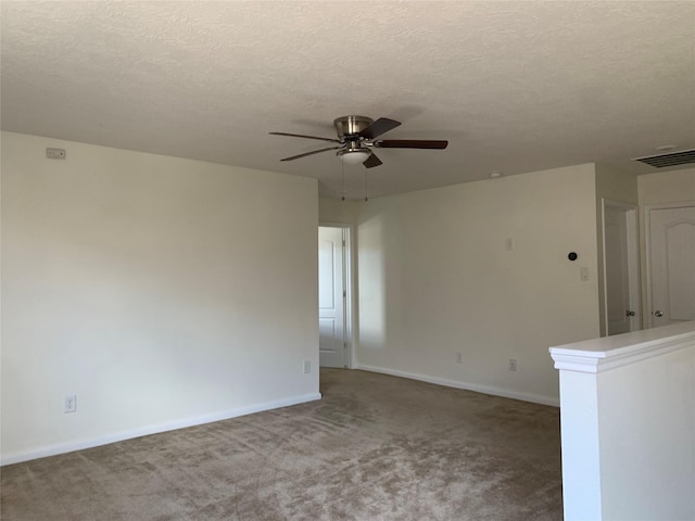 15815 Copper Oak Ln, Houston, TX 77084 - carpeted empty room featuring a ceiling fan and a textured ceiling