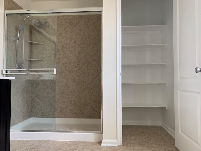 15815 Copper Oak Ln, Houston, TX 77084 - bathroom featuring a shower stall and tile patterned floors
