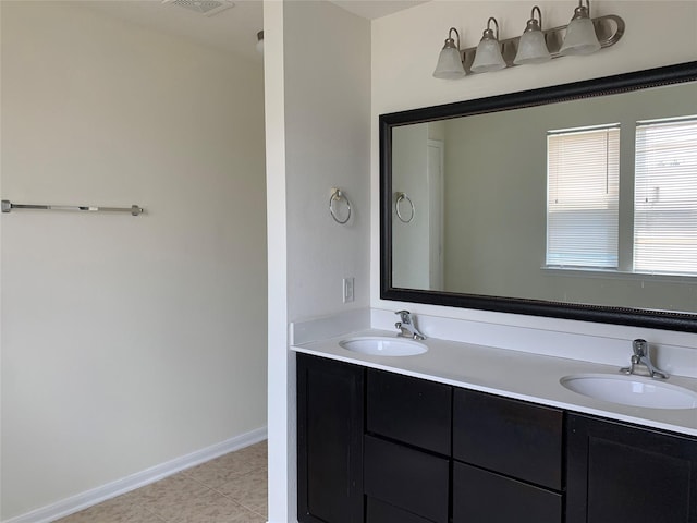 15815 Copper Oak Ln, Houston, TX 77084 - bathroom featuring double vanity and tile patterned floors
