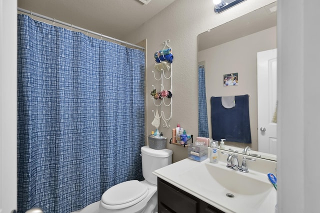 7455 Durango Creek Dr, Magnolia, TX 77354 - bathroom featuring vanity and a textured wall