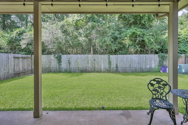 7455 Durango Creek Dr, Magnolia, TX 77354 - fenced backyard with a patio