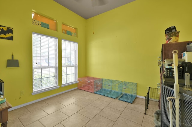 7455 Durango Creek Dr, Magnolia, TX 77354 - empty room with plenty of natural light, tile patterned floors, and ceiling fan