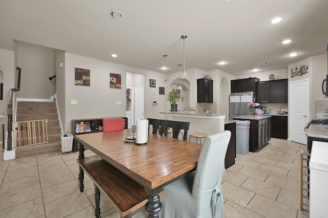 7455 Durango Creek Dr, Magnolia, TX 77354 - dining room featuring recessed lighting, stairs, and light tile patterned flooring