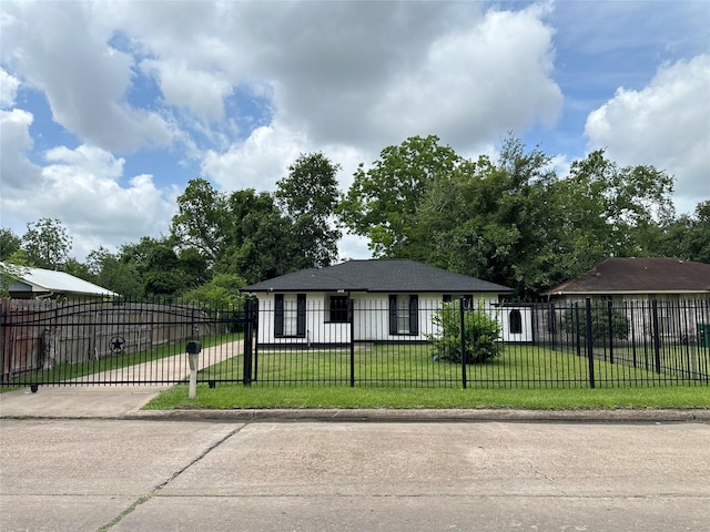 6618 Hopper Rd, Houston, TX 77016 - view of front of property featuring concrete driveway and a fenced front yard